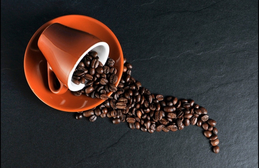 Coffee cup and beans