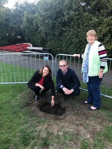 Victoria Prentis MP planting one of the trees at Garth Park with Councillors Jason Slaymaker and Lynn Pratt